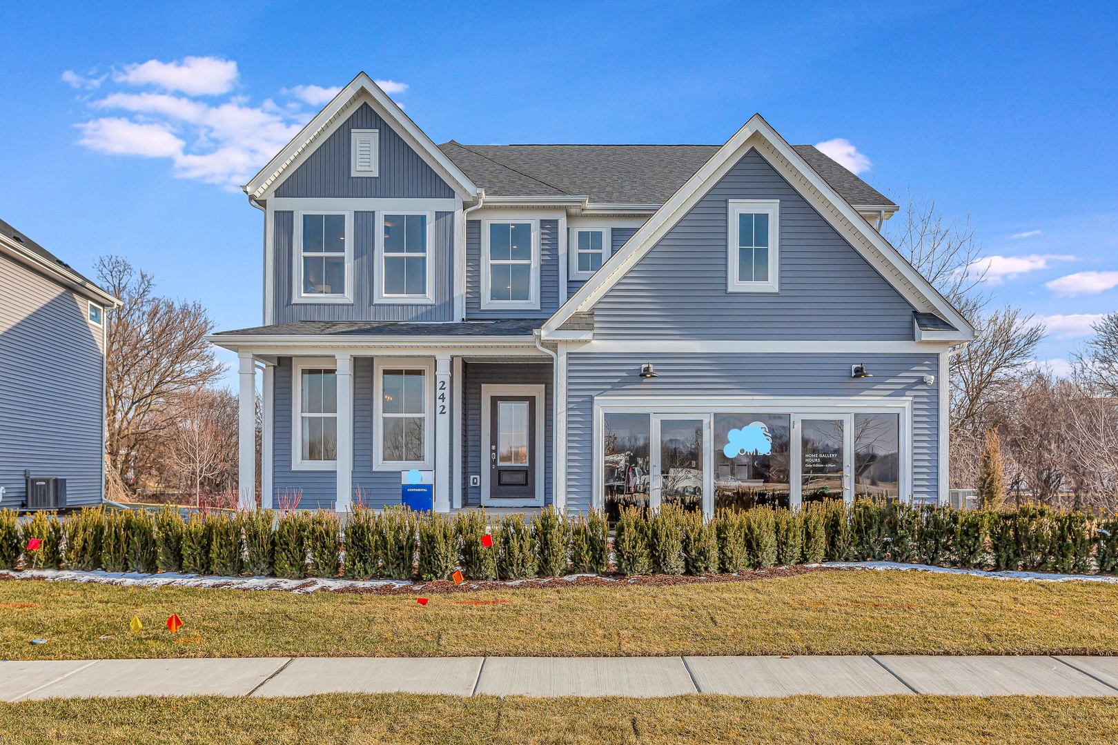 a front view of a house with a yard