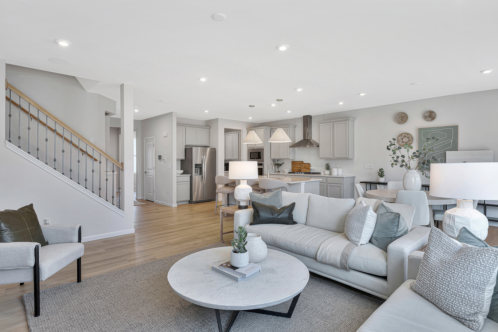 337 Popeck Course Batavia, IL 60510 - Photo 11 of 20 a living room with furniture and a dining table with kitchen view