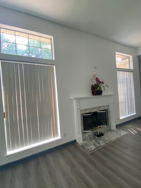 4740 Billingsgate Road Antioch, TN 37013 - Photo 13 of 18 a living room with a fireplace with wooden floor