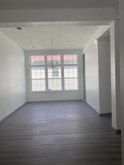 4740 Billingsgate Road Antioch, TN 37013 - Photo 14 of 18 a view of an empty room with wooden floor and a window