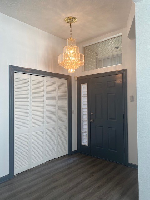 4740 Billingsgate Road Antioch, TN 37013 - Photo 17 of 18 a view of a hallway with wooden floor and chandelier