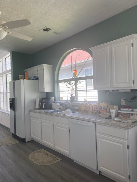 4740 Billingsgate Road Antioch, TN 37013 - Photo 5 of 18 a kitchen with white cabinets and a window