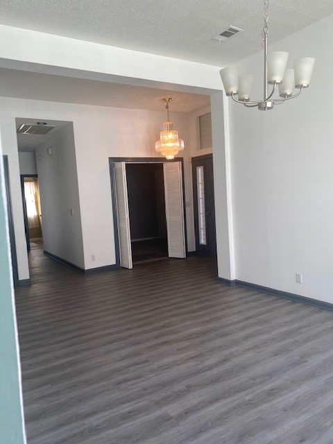 4740 Billingsgate Road Antioch, TN 37013 - Photo 8 of 18 a view of a livingroom with wooden floor and chandelier