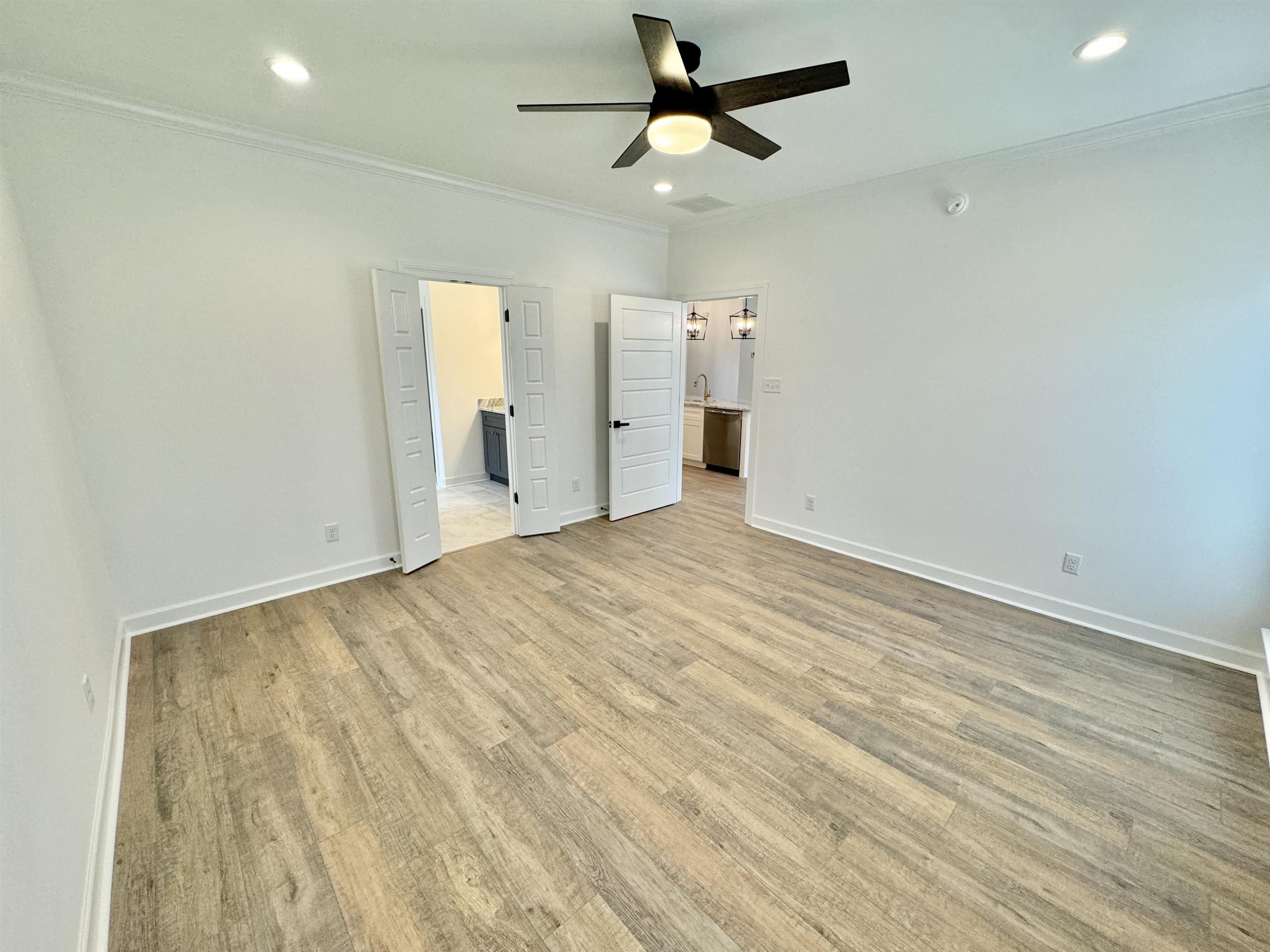 17 Edith Lane Atoka, TN 38004 - Photo 20 of 36 an empty room with a empty space and a ceiling fan