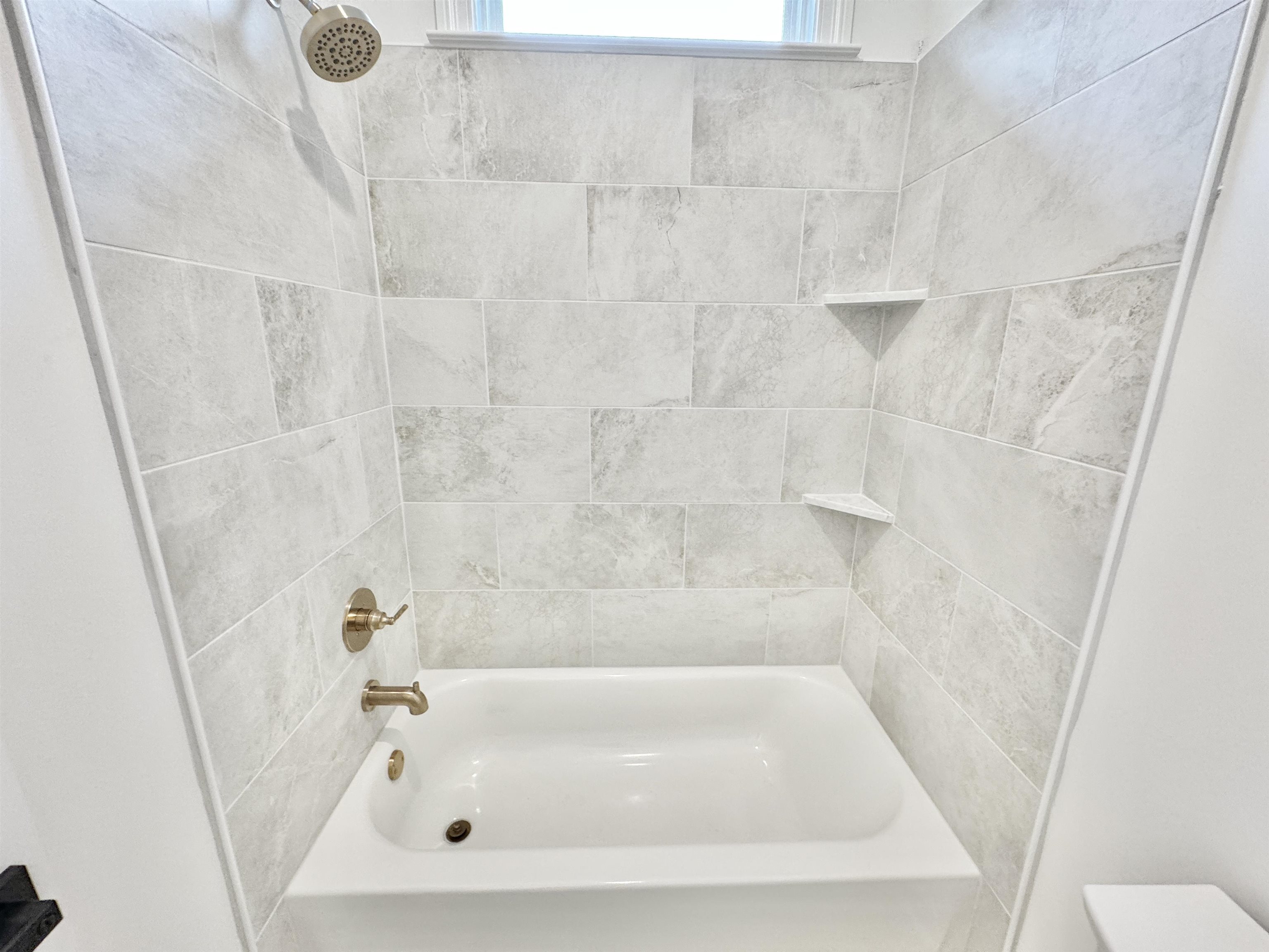 17 Edith Lane Atoka, TN 38004 - Photo 34 of 36 a bathroom with a tub