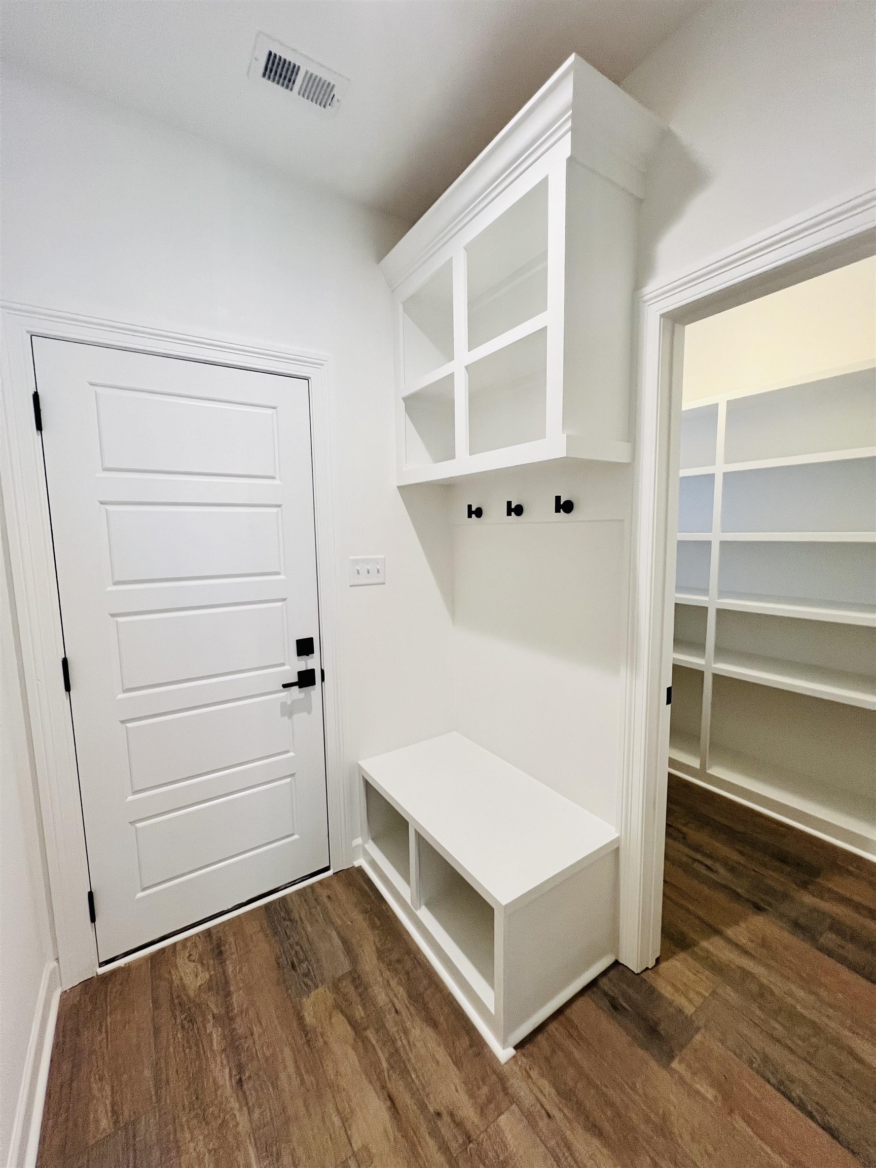 17 Edith Lane Atoka, TN 38004 - Photo 10 of 36 a view of an empty room with wooden floor and closet