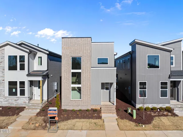 a front view of a building with windows