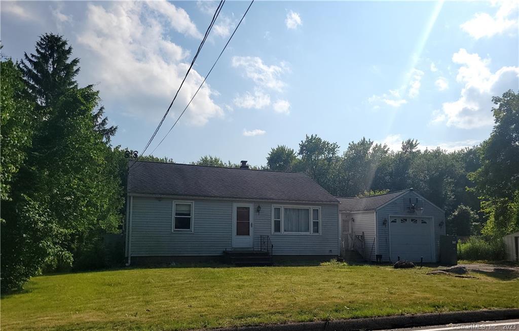 143 Plank Road Prospect, CT 06712 - Photo 1 of 1 a front view of a house with a yard