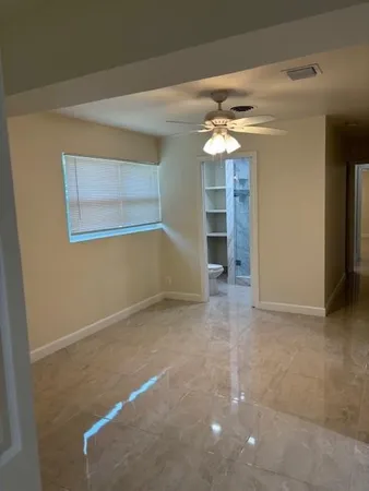 a view of a utility room with a sink