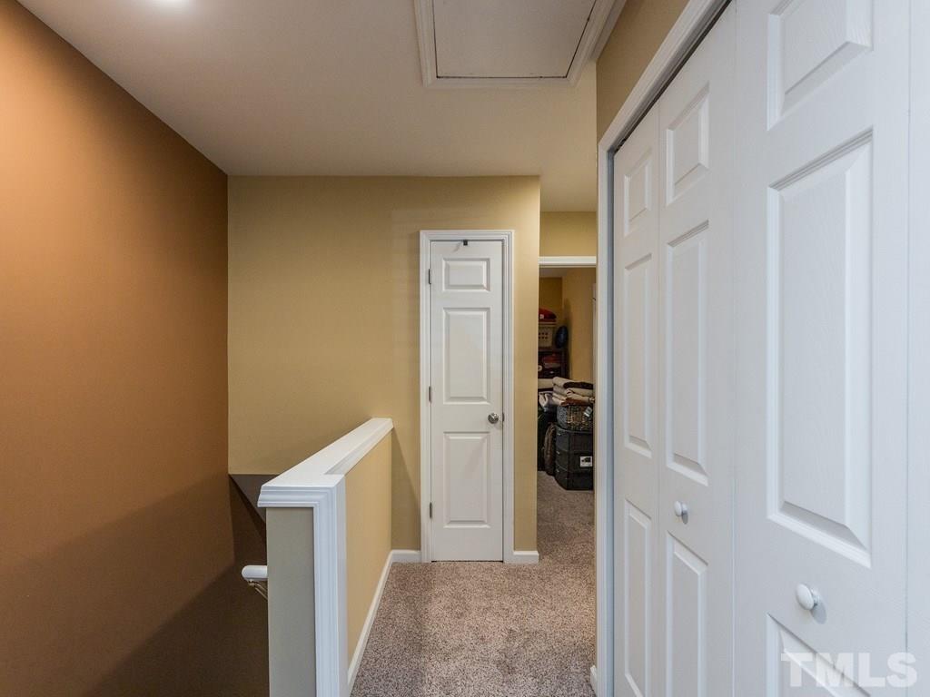 4312 Vienna Crest Drive Raleigh, NC 27613 - Photo 22 of 26 a view of walk in closet