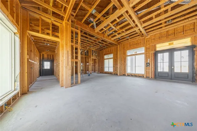 a view of a room with a large windows
