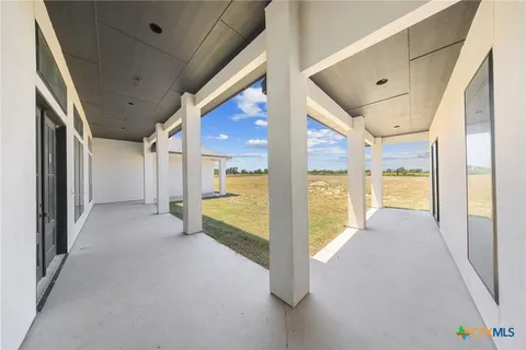 a view of an house with backyard porch and livingroom