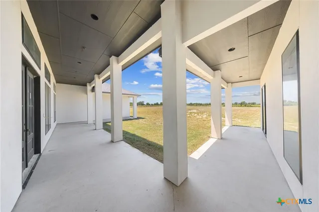 a view of an house with backyard porch and livingroom