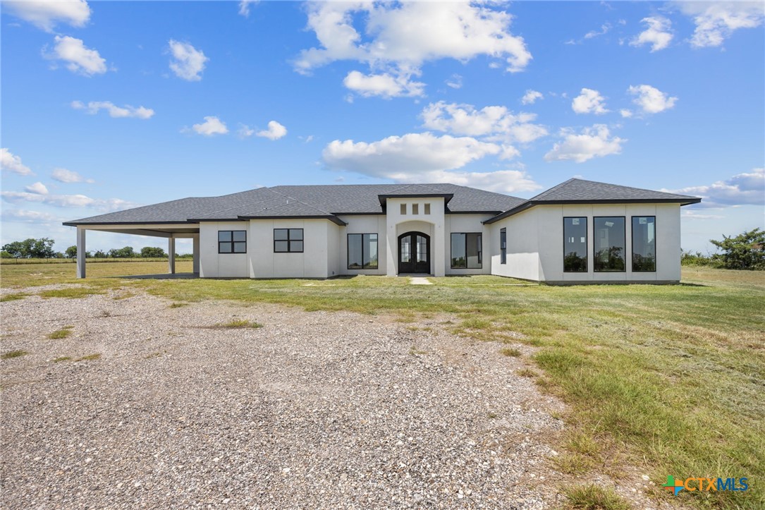 11240 Pendleton-Troy Road Troy, TX 76579 - Photo 23 of 30 a view of house with a big yard and large trees