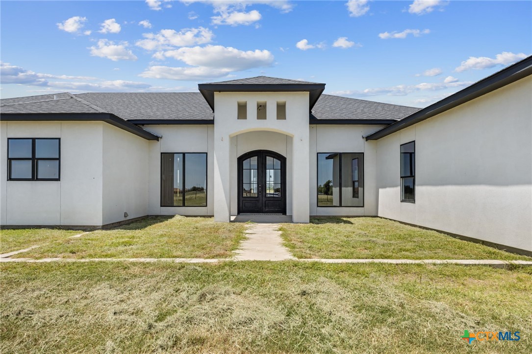 11240 Pendleton-Troy Road Troy, TX 76579 - Photo 24 of 30 a view of a house with a swimming pool and a yard