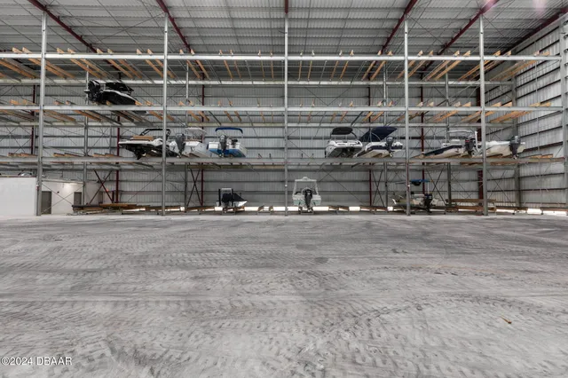 an aerial view of house with yard