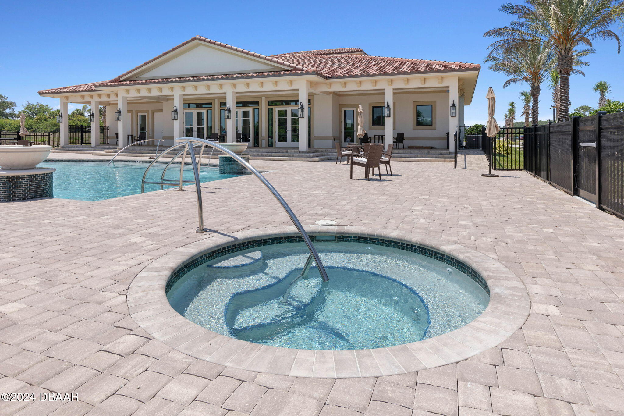 10 Rio Vista Drive Palm Coast, FL 32137 - Photo 23 of 39 a view of a house with backyard sitting area and swimming pool