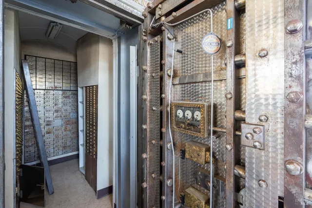 a living room with a rug and a couch