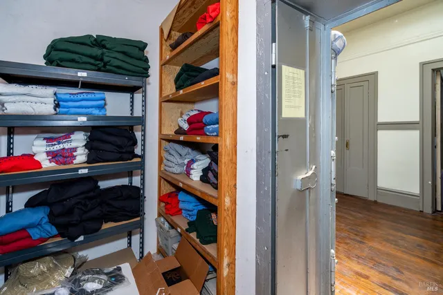 a bathroom with a sink a mirror and a window