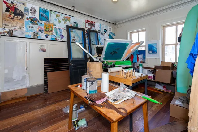 a view of livingroom with furniture and wooden floor