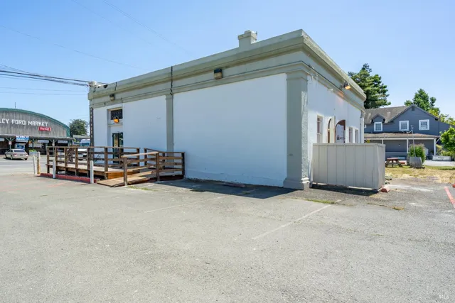 a front view of a house with a patio