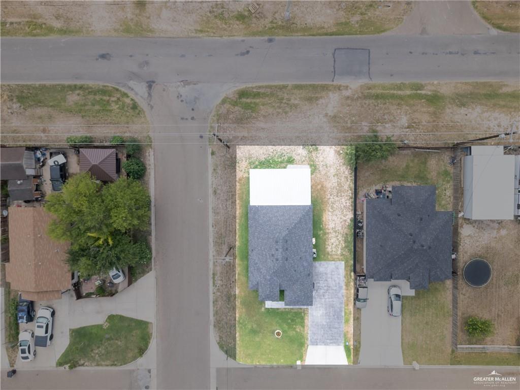 620 Oaxaca Street Alton, TX 78573 - Photo 21 of 23 an aerial view of a house with a backyard space