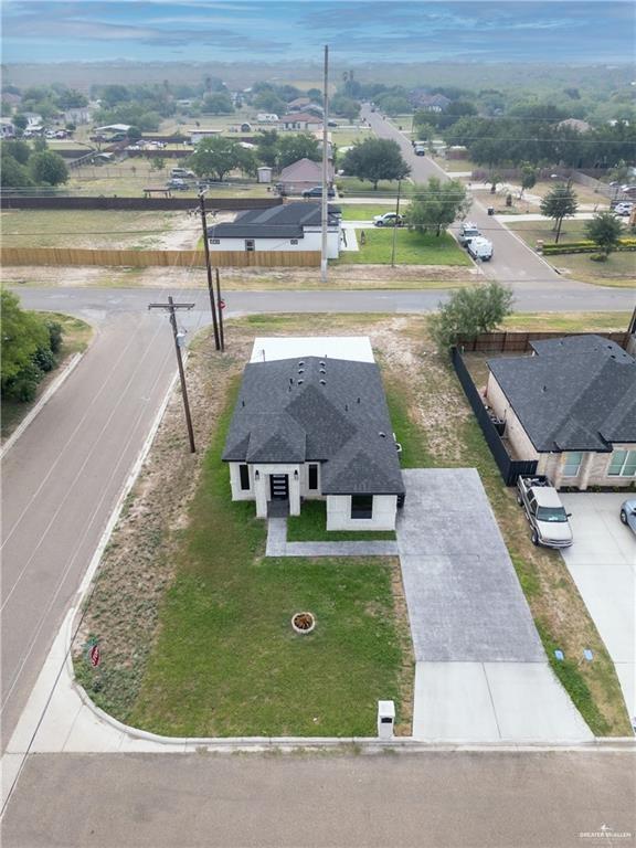 620 Oaxaca Street Alton, TX 78573 - Photo 23 of 23 an aerial view of a house with a yard