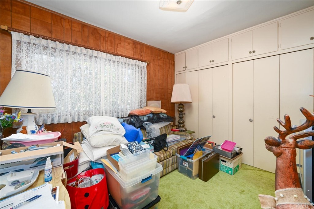 9505 Raviller Drive Downey, CA 90240 - Photo 26 of 54 a room with furniture and a wooden floor