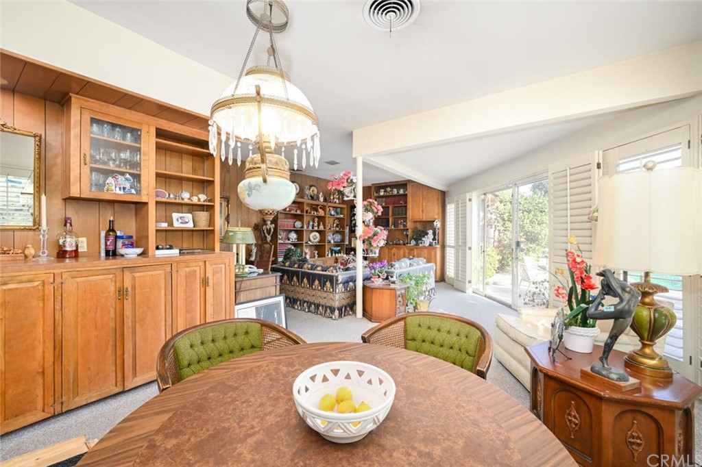 9505 Raviller Drive Downey, CA 90240 - Photo 33 of 54 a very nice looking dining room with a table or chairs and a wooden floor