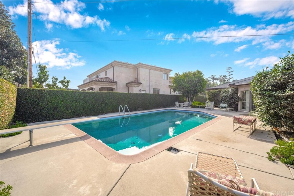 9505 Raviller Drive Downey, CA 90240 - Photo 48 of 54 a view of swimming pool with a yard