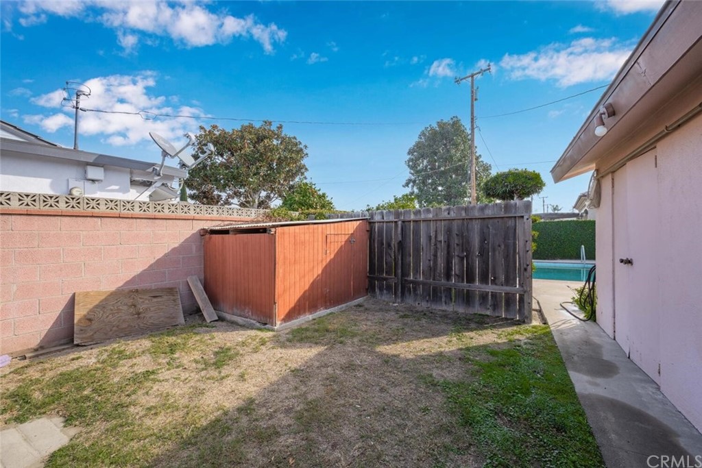 9505 Raviller Drive Downey, CA 90240 - Photo 49 of 54 a view of a backyard with a fence
