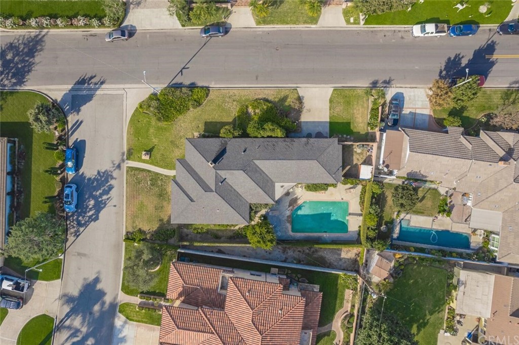 9505 Raviller Drive Downey, CA 90240 - Photo 54 of 54 an aerial view of a house with a swimming pool