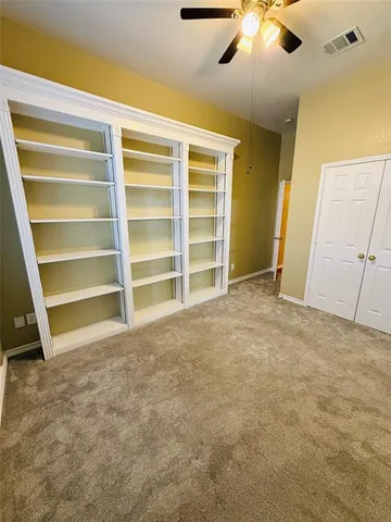 a kitchen with stainless steel appliances granite countertop wooden cabinets a sink and a stove