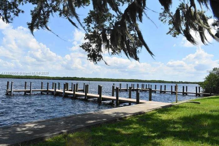 3147 Trevino Terrace, Unit 2 Punta Gorda, FL 33983 - Photo 21 of 24 a view of a house with backyard and sitting area