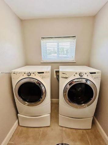 3147 Trevino Terrace, Unit 2 Punta Gorda, FL 33983 - Photo 24 of 24 a utility room with dryer and washer