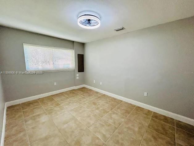 3147 Trevino Terrace, Unit 2 Punta Gorda, FL 33983 - Photo 6 of 24 an empty room with a window