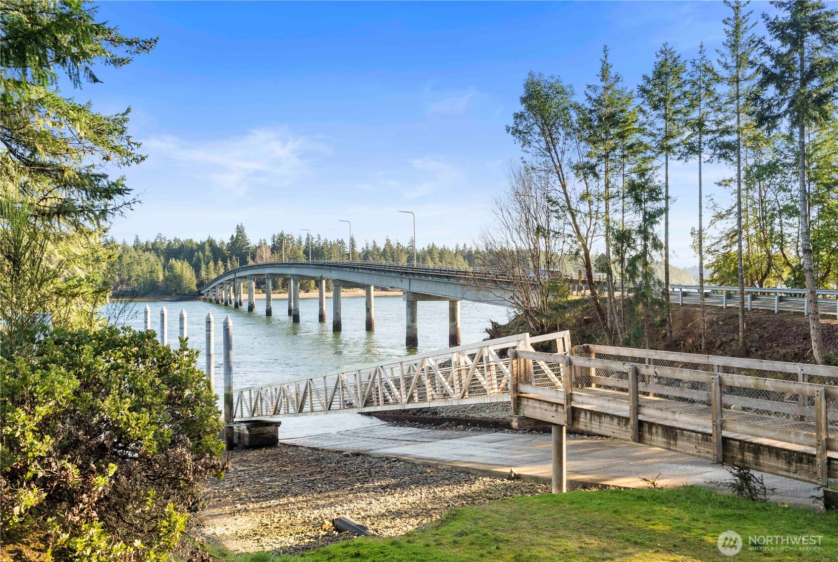 0 East Harstine Island Road South Shelton, WA 98584 - Photo 17 of 20 a view of a house with backyard and porch
