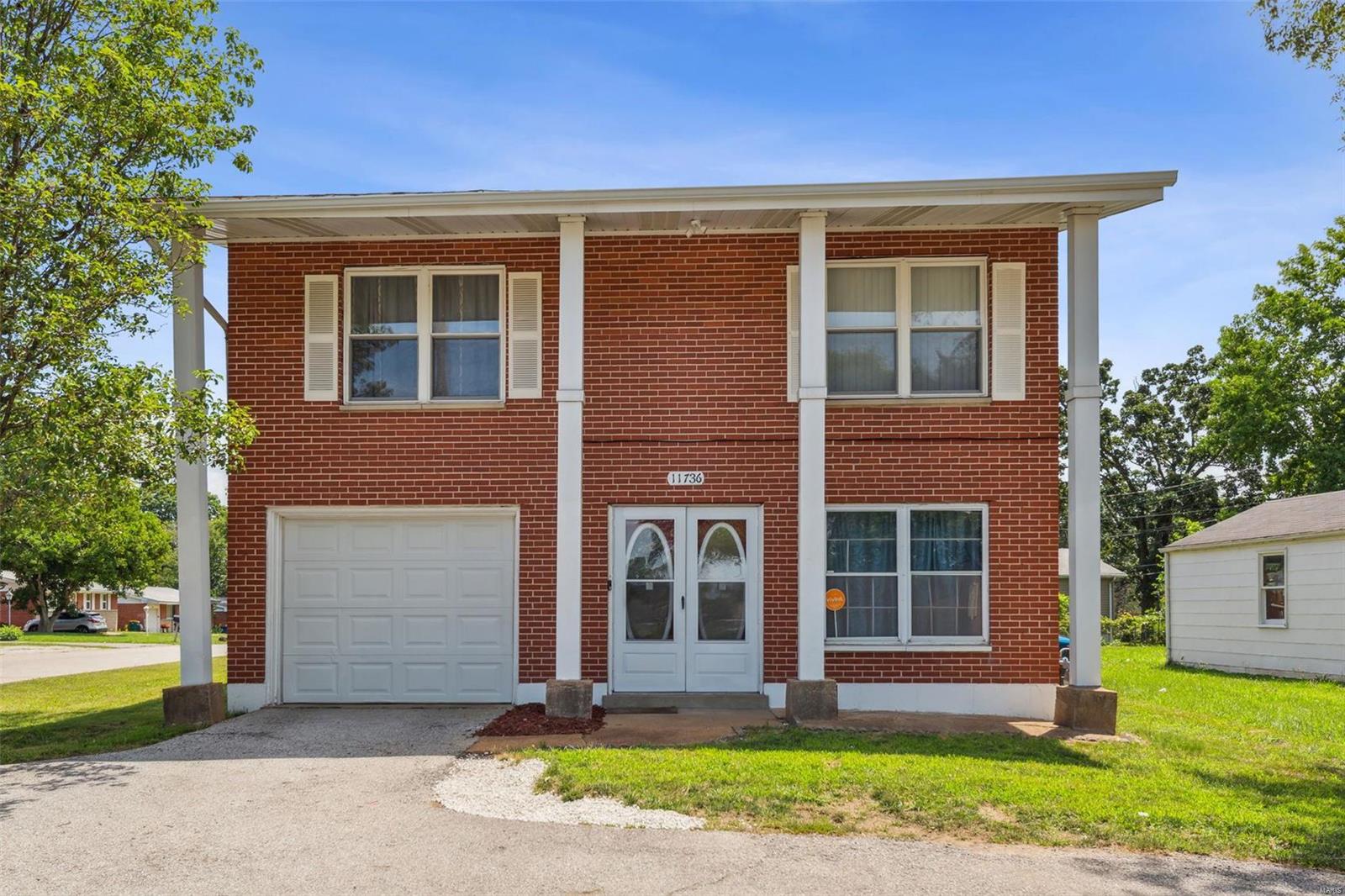 11736 Bellefontaine Road St. Louis, MO 63138 - Photo 1 of 19