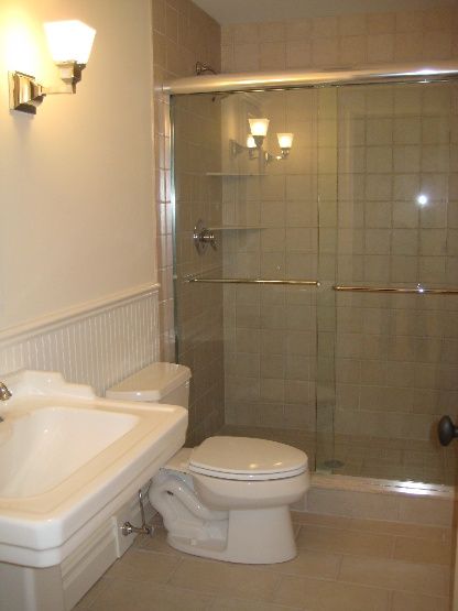 45 Sherrill Road East Hampton, NY 11937 - Photo 14 of 22 a bathroom with a toilet a sink and shower