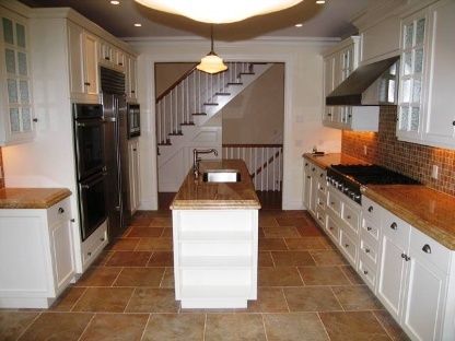 45 Sherrill Road East Hampton, NY 11937 - Photo 3 of 22 a kitchen with granite countertop a refrigerator a stove and a sink