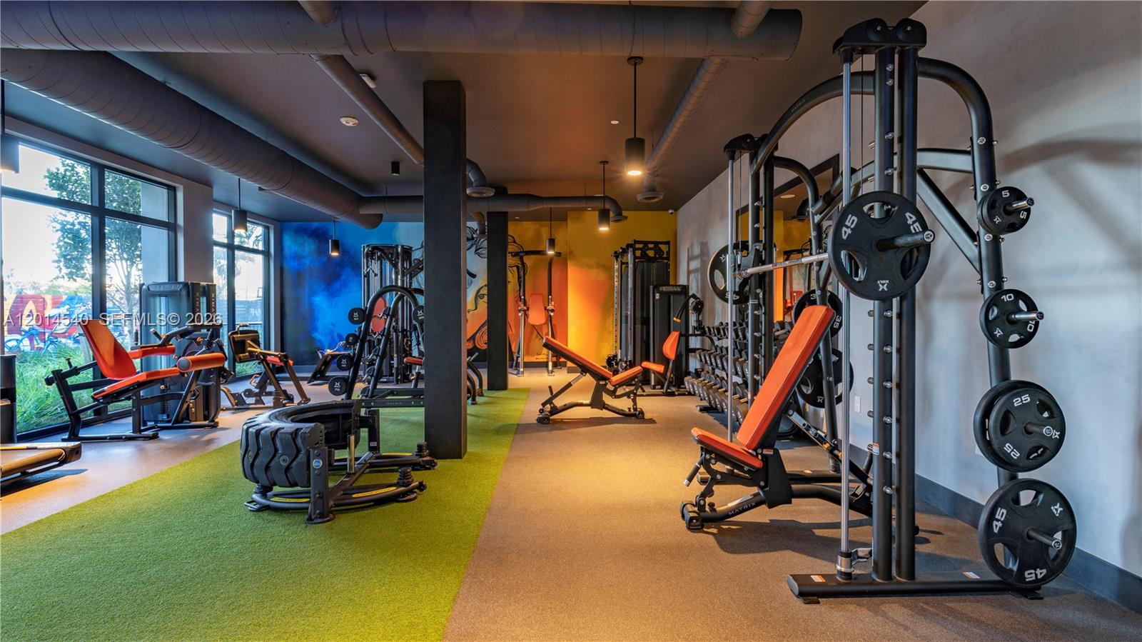6970 Southwest 40th Street, Unit 224 Miami, FL 33155 - Photo 9 of 20 a view of a room with gym equipment