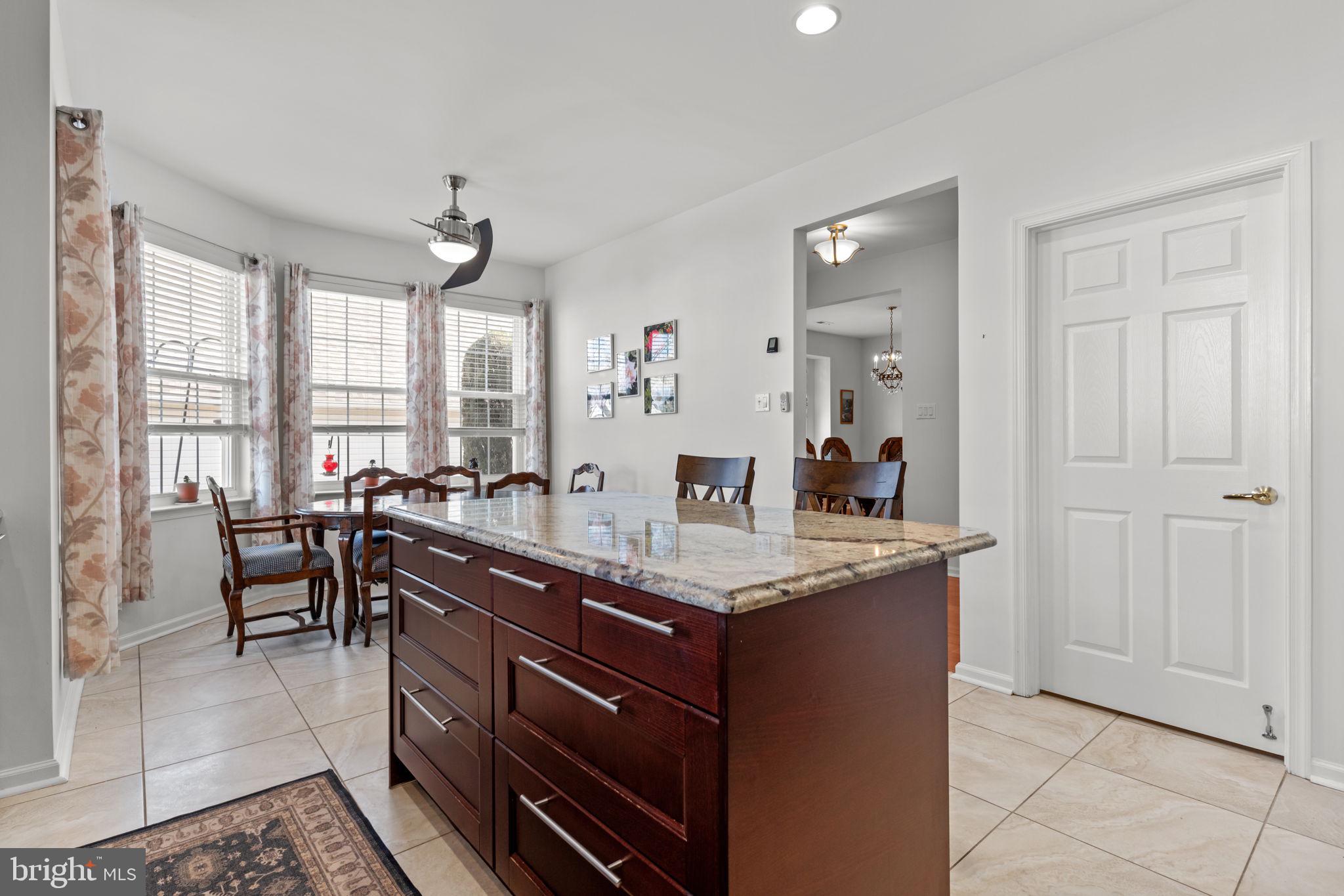 8 Bluebonnet Road Langhorne, PA 19047 - Photo 8 of 25 Kitchen and Casual Dining Area