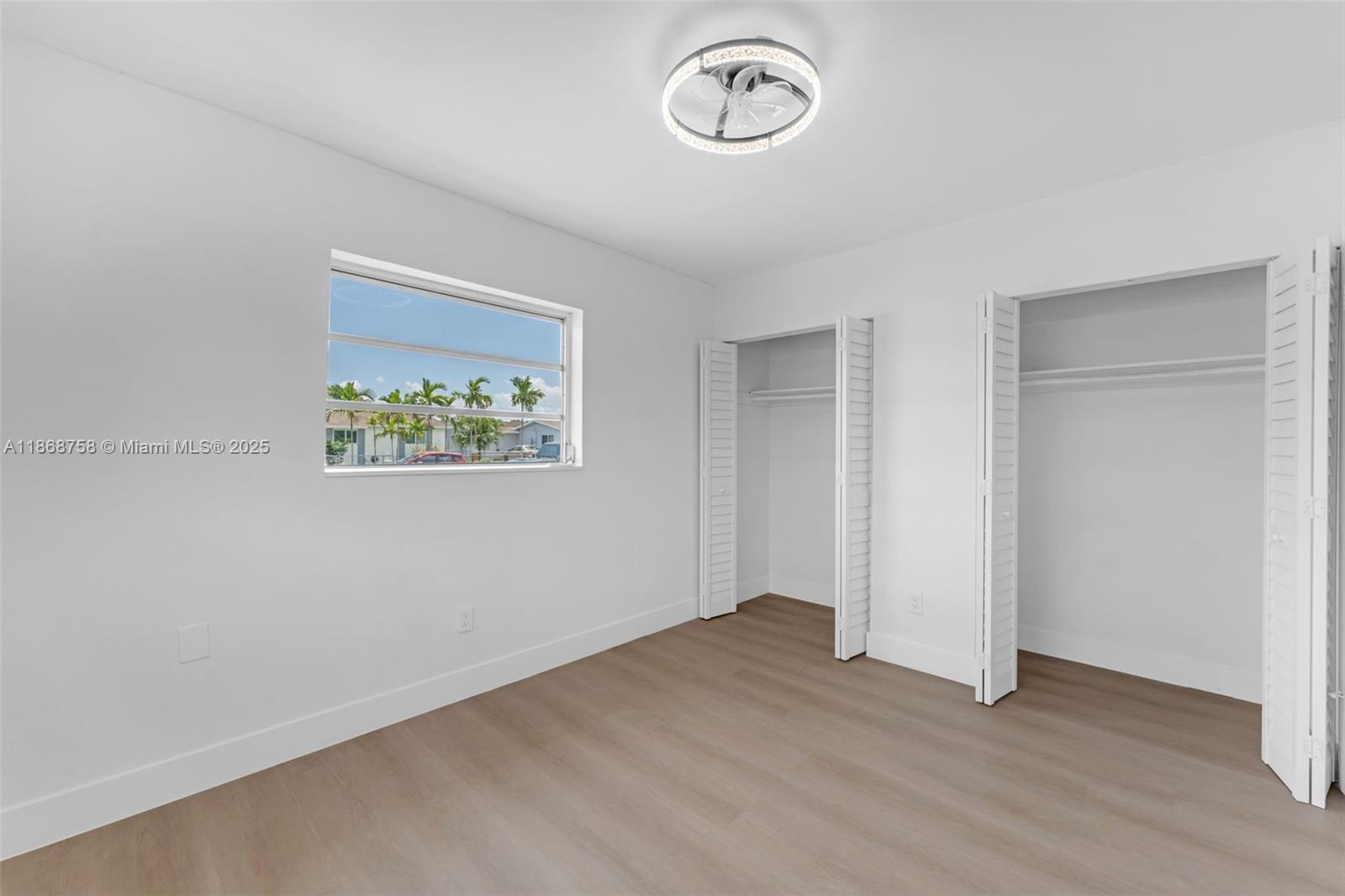 11711 Southwest 181st Terrace Miami, FL 33177 - Photo 20 of 35 an empty room with a workbench