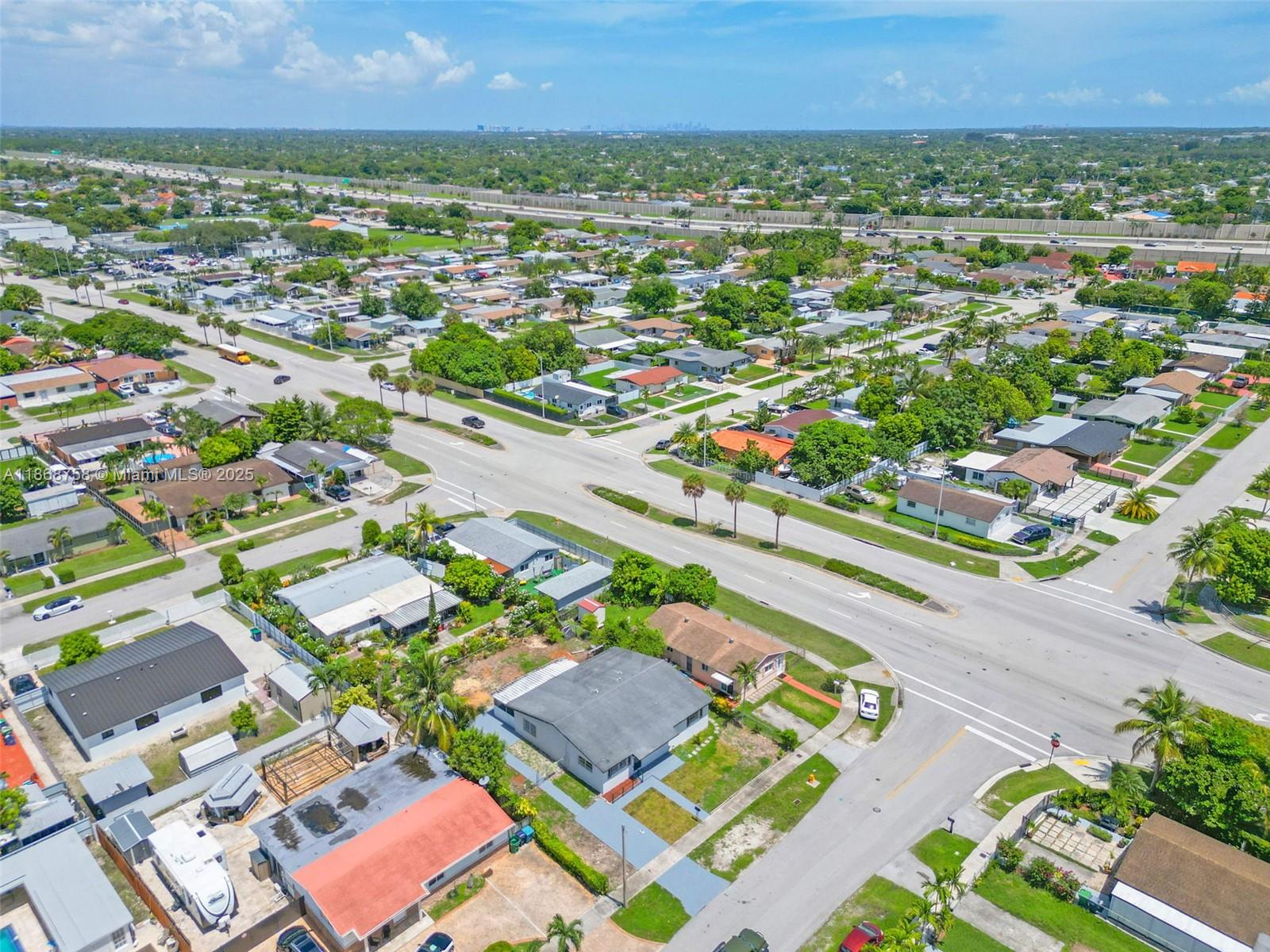11711 Southwest 181st Terrace Miami, FL 33177 - Photo 35 of 35 an aerial view of residential houses with outdoor space