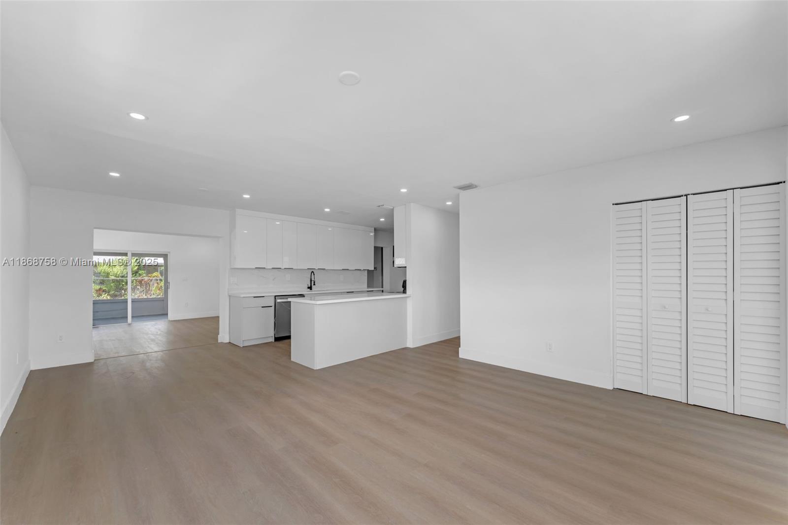 11711 Southwest 181st Terrace Miami, FL 33177 - Photo 4 of 35 a view of kitchen with wooden floor