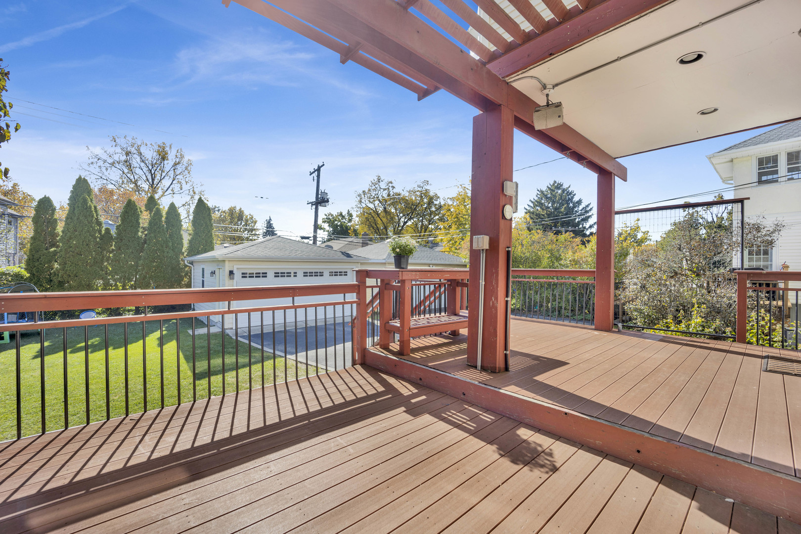 261 Herrick Road Riverside, IL 60546 - Photo 25 of 32 a view of a balcony with wooden floor