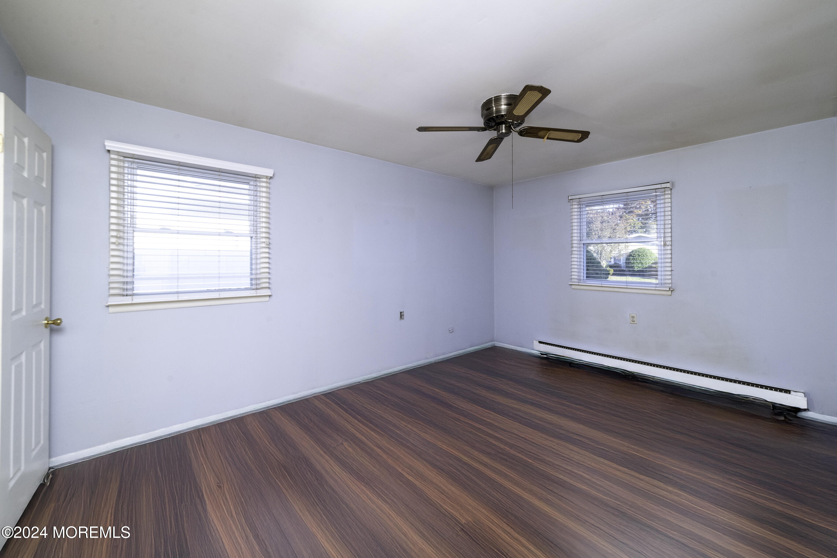 16 Lamb Road Brick, NJ 08724 - Photo 18 of 23 wooden floor in an empty room with a window