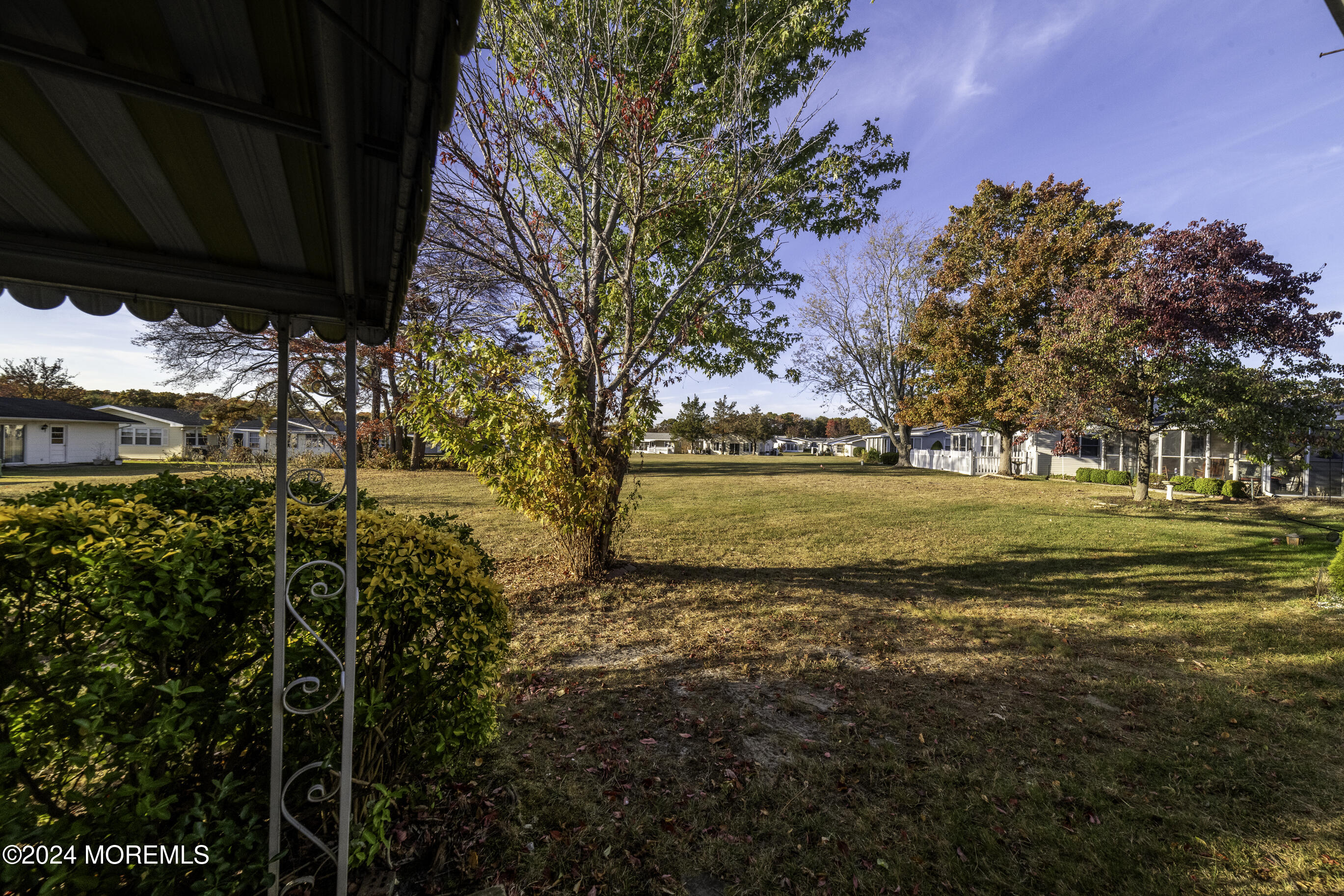 16 Lamb Road Brick, NJ 08724 - Photo 22 of 23 a view of a yard with an outdoor space
