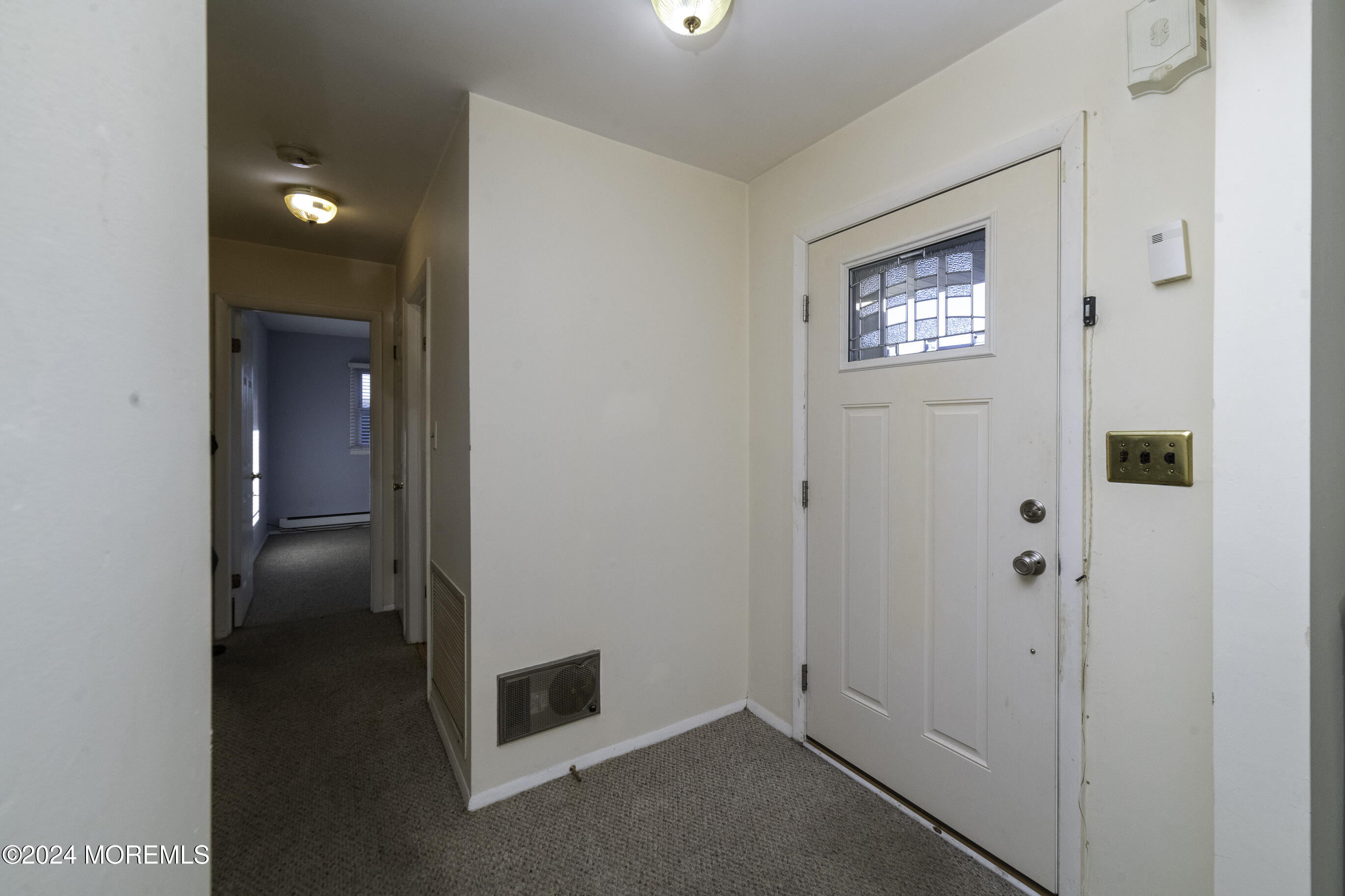16 Lamb Road Brick, NJ 08724 - Photo 4 of 23 a view of a hallway with closet area