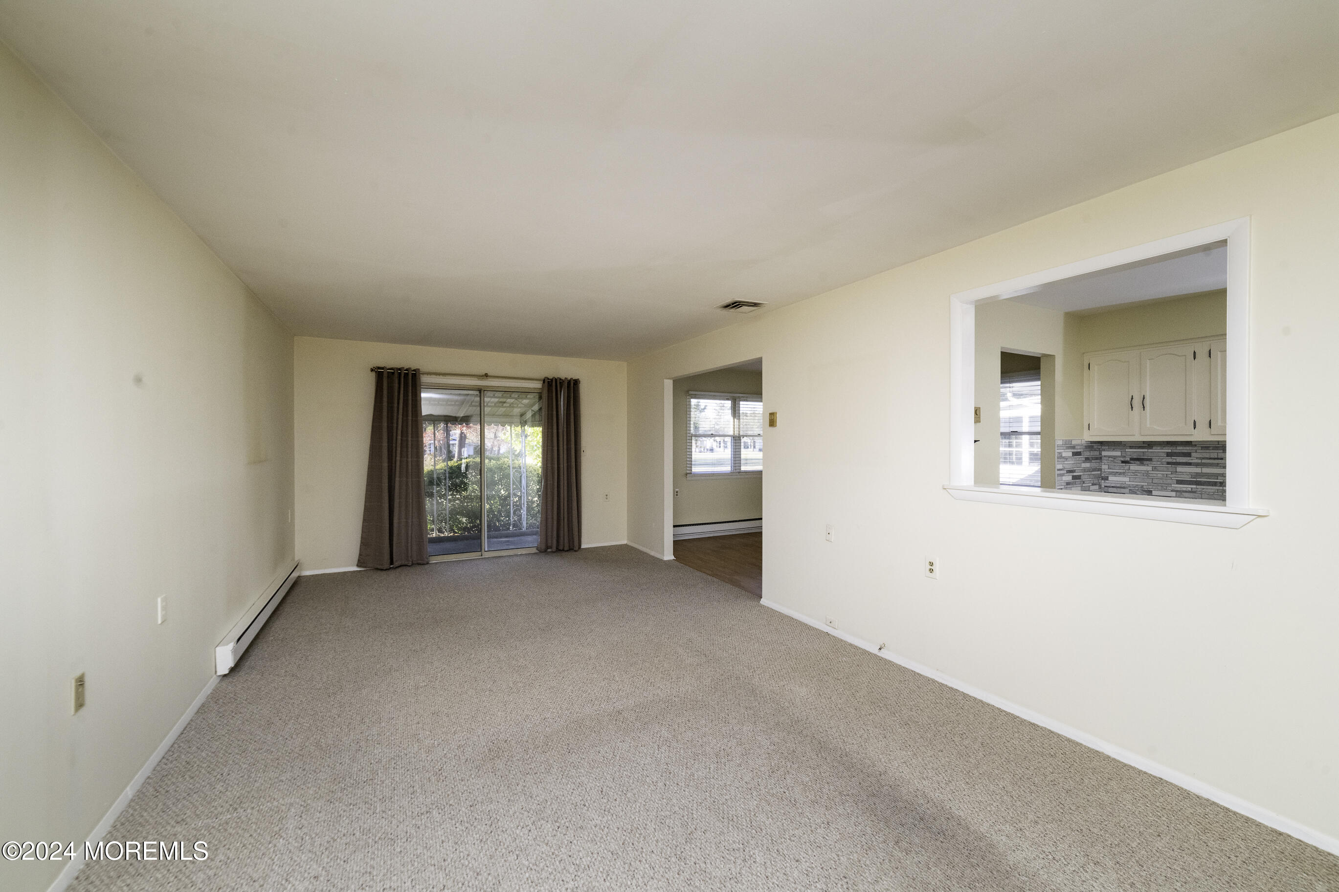 16 Lamb Road Brick, NJ 08724 - Photo 5 of 23 an empty room with windows and bathroom